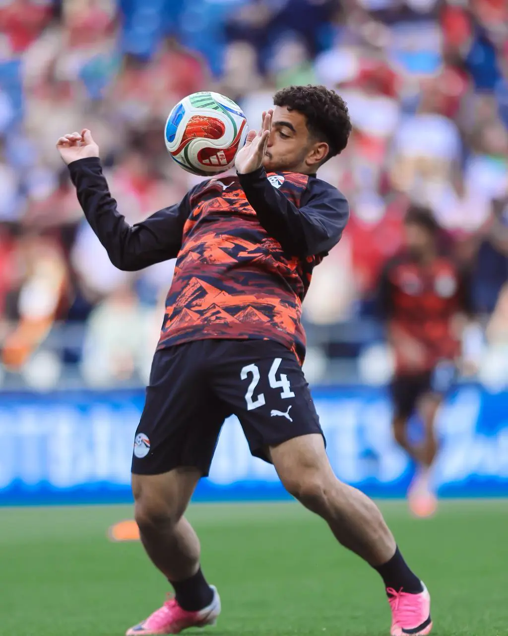 بالصور.. إحماءات لاعبي منتخب مصر قبل انطلاق مواجهة إيران في المونديال